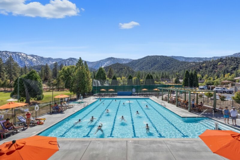 Pine Mountain Club Olympic-style pool and spa surrounded by mountains and pine trees