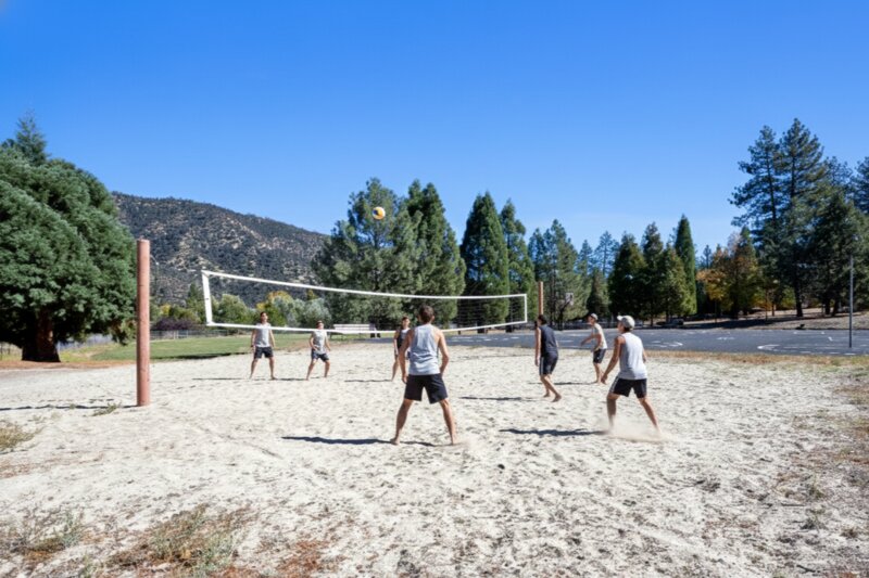 Sand volleyball game at Pine Mountain Club outdoor court