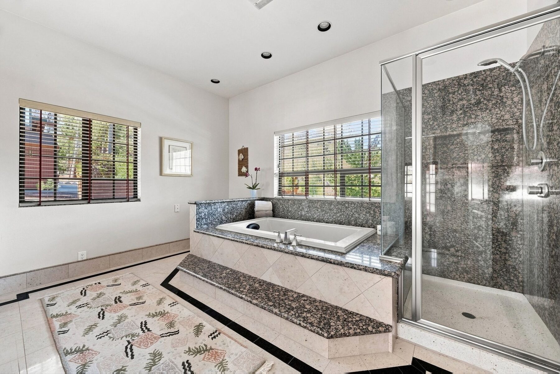 16330 Askin Drive — bathroom with soaking tub, walk-in shower, and granite surround