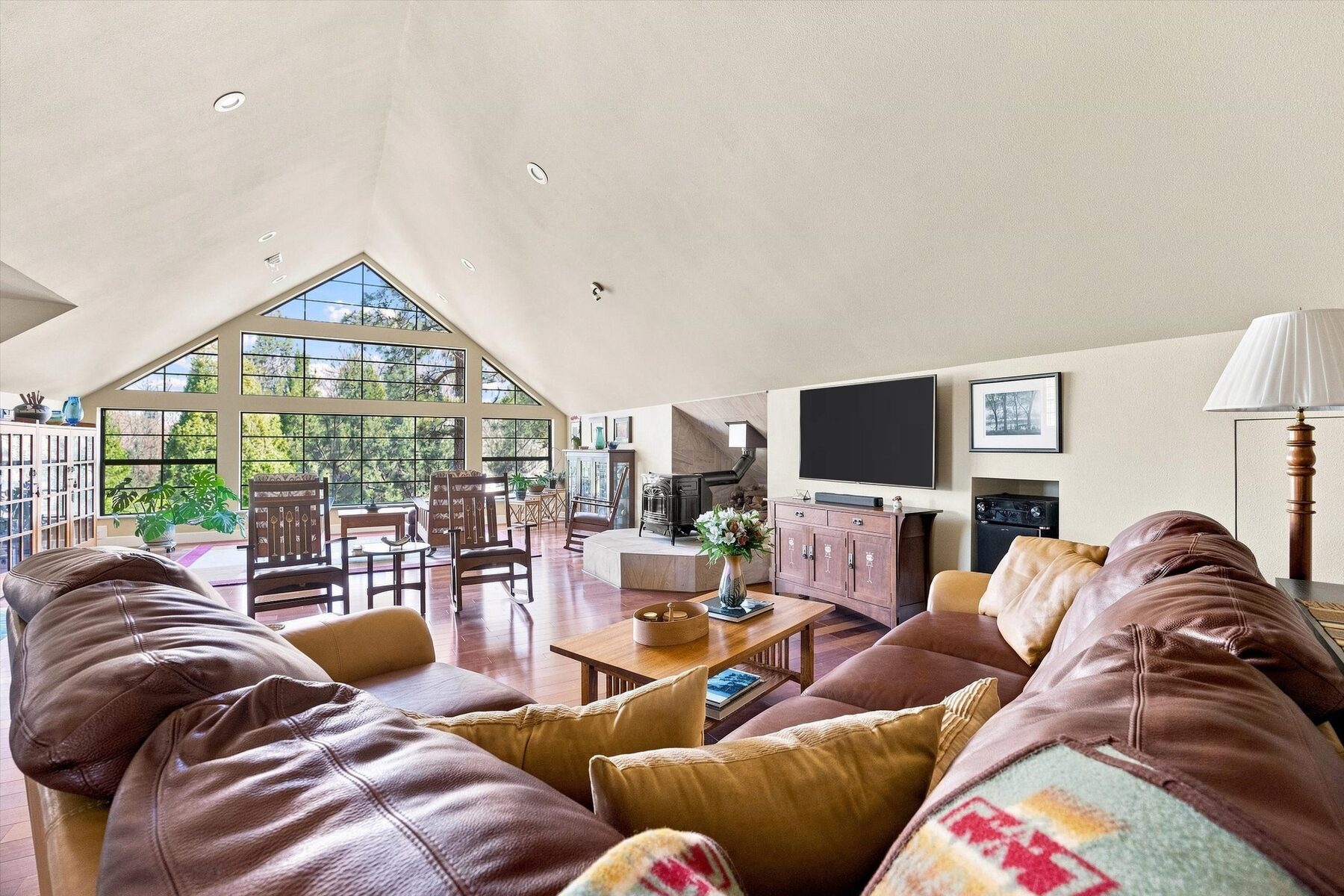 16330 Askin Drive — great room with vaulted ceiling, seating area, and fireplace