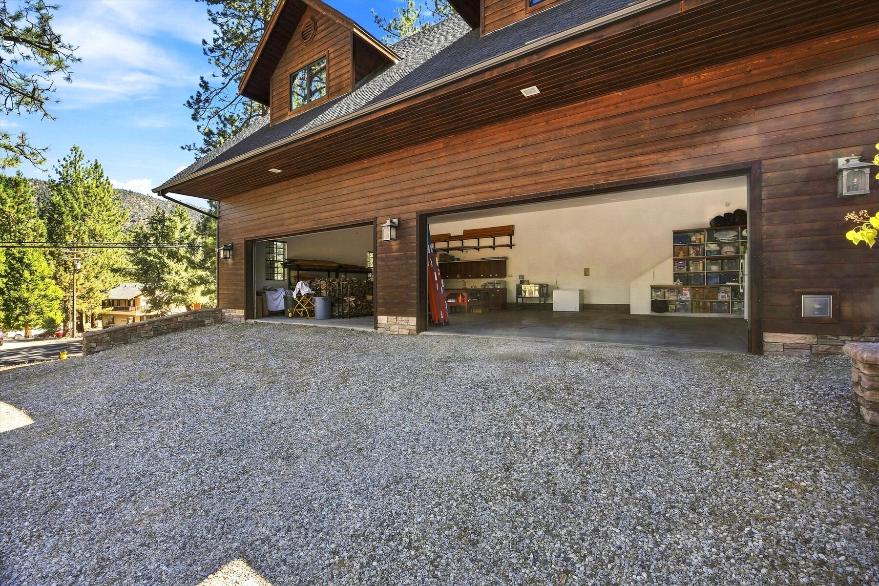 16330 Askin Drive — exterior view of the oversized two-car garage and mountain home