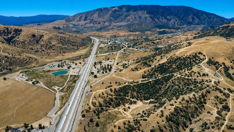 Aerial view of Lebec, California with Interstate 5 and surrounding mountains