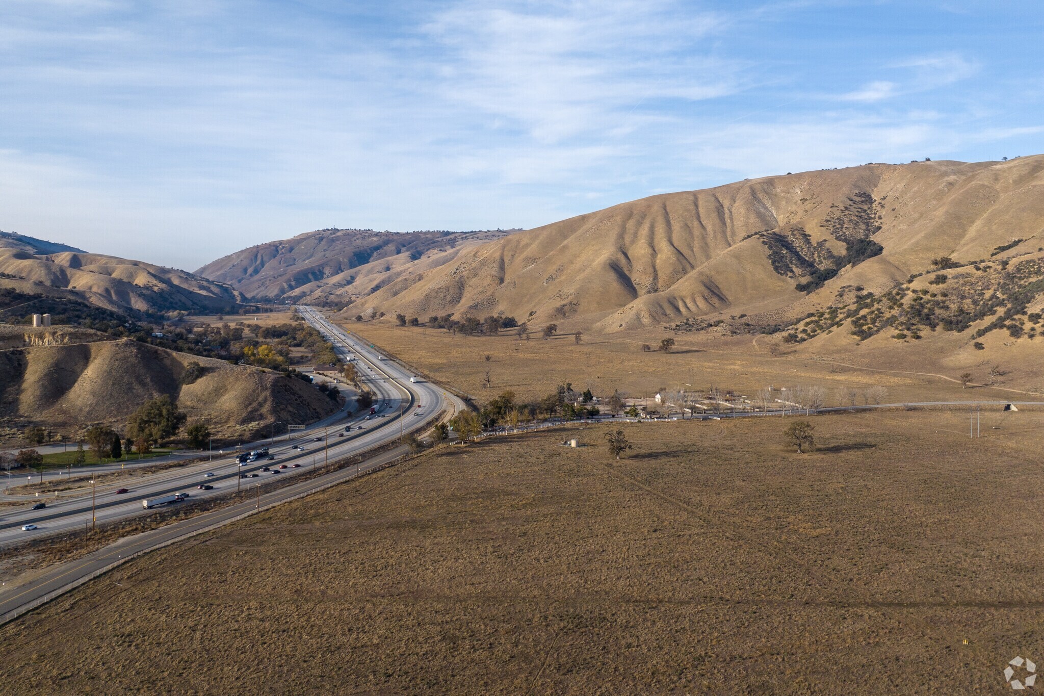 Aerial view of Lebec, California along Interstate 5 with Tejon Pass and surrounding mountains