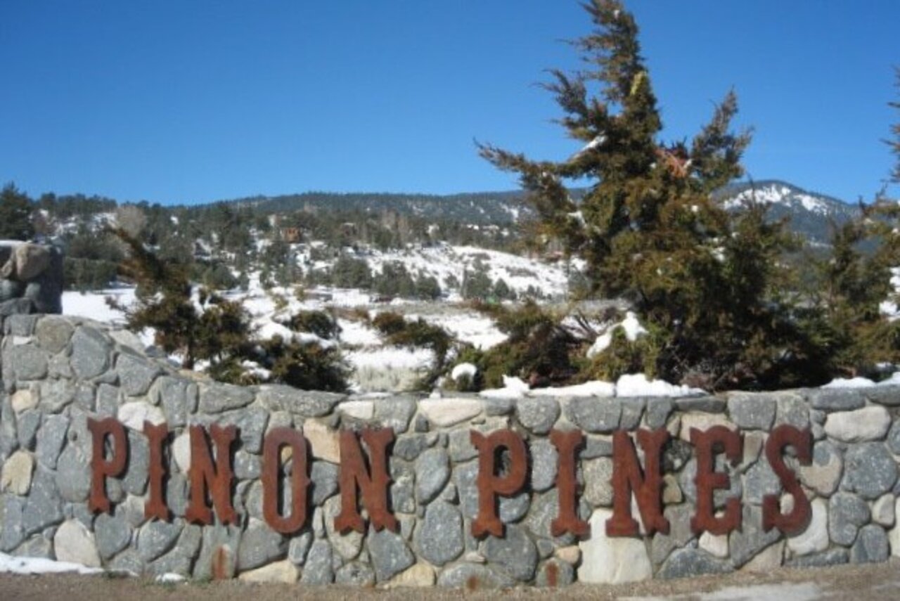 Pinion Pines Estates community among pine trees