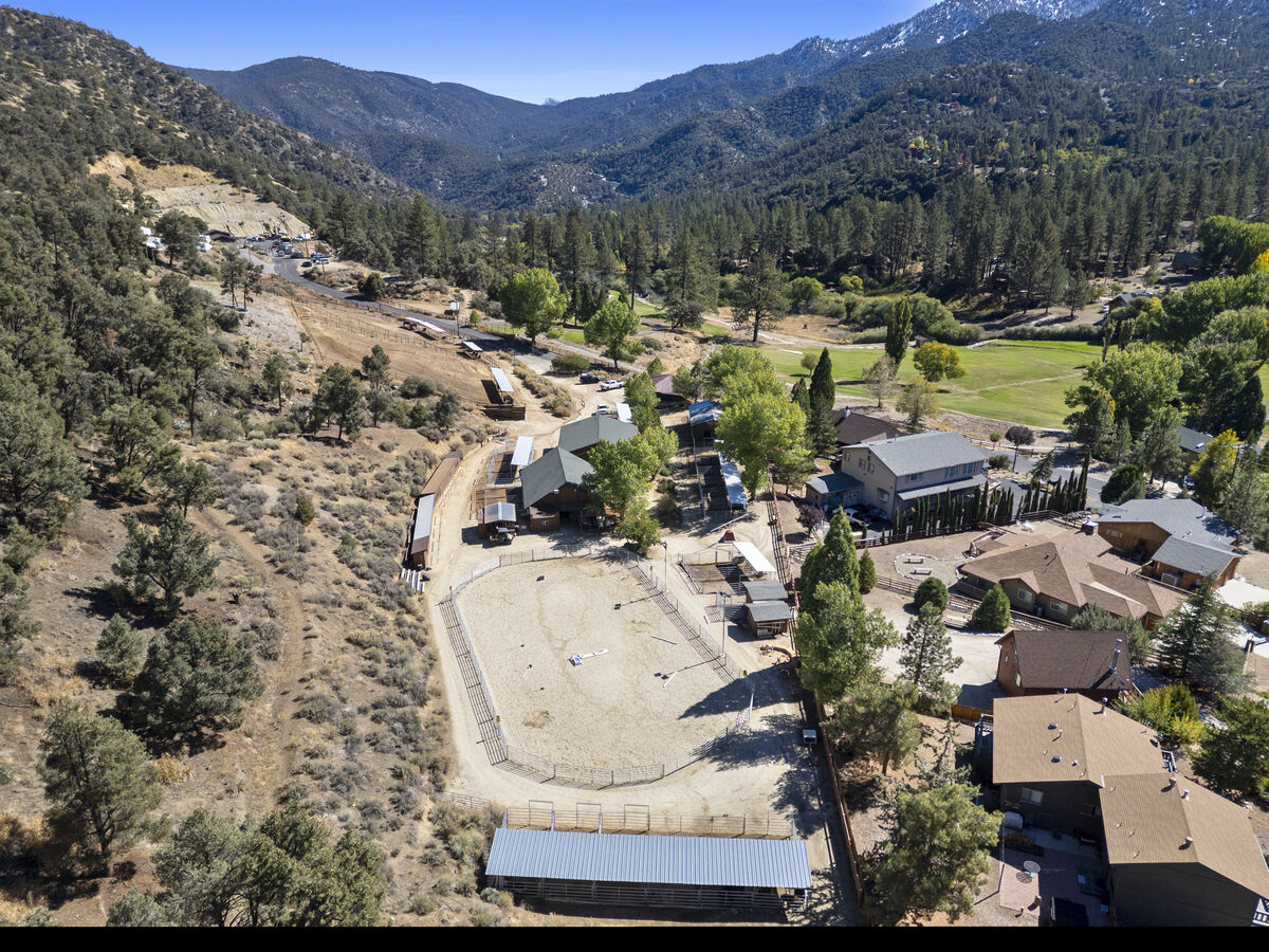 Aerial view of PMC Equestrian Center arena with Pine Mountain Club community