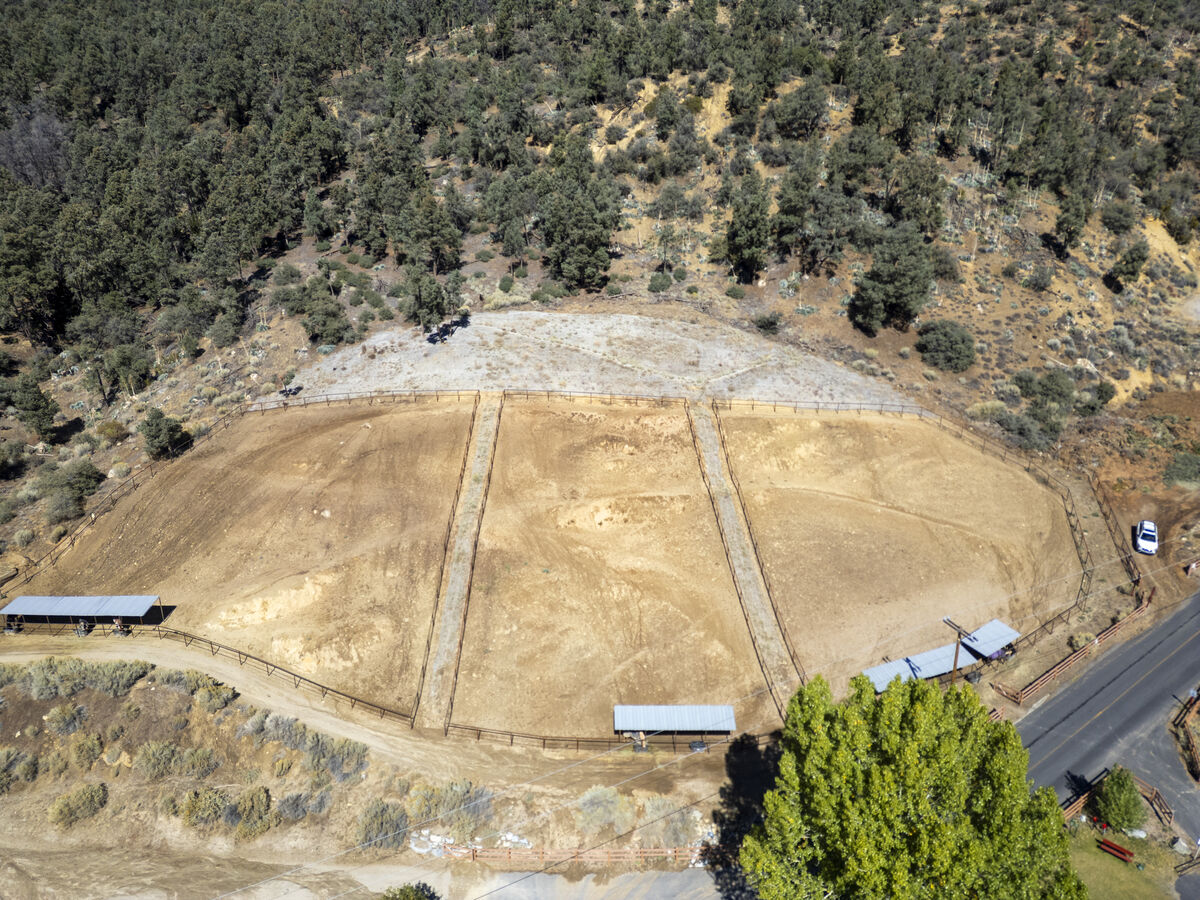 Aerial view of hillside turnout paddocks at PMC Equestrian Center