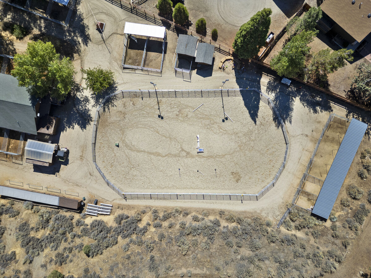 Aerial view of the main riding arena at Pine Mountain Club Equestrian Center