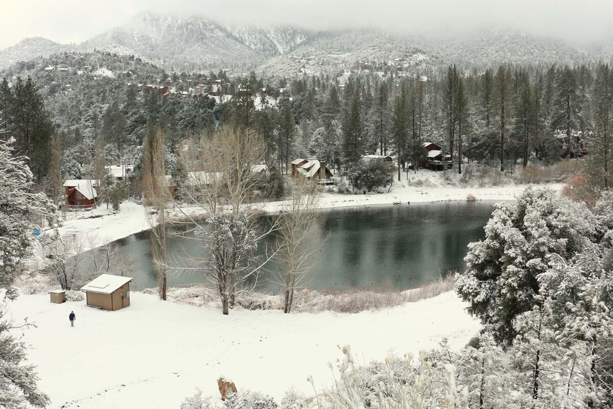 Pine Mountain Club lake surrounded by snow in winter
