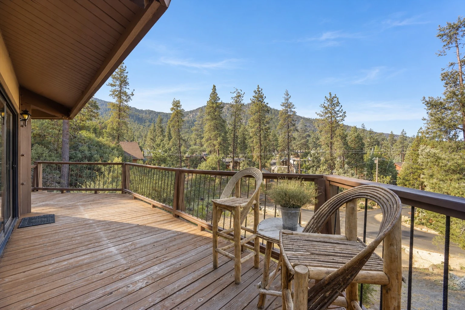 2104 Ironwood Drive — Upper deck with seating overlooking the mountains and forest