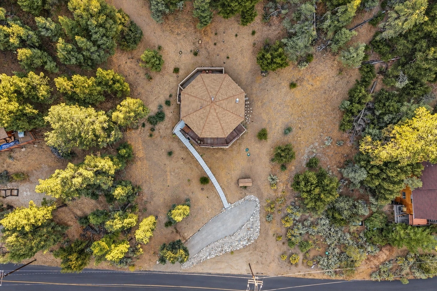 2104 Ironwood Drive — Overhead view of the hexagonal home, driveway and surrounding trees